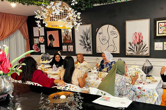 Groupo of women enjoying afternoon tea at a table